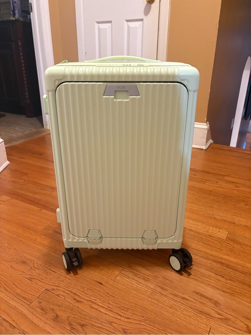 NOBL Carry On suitcase, expandable; NEVER USED